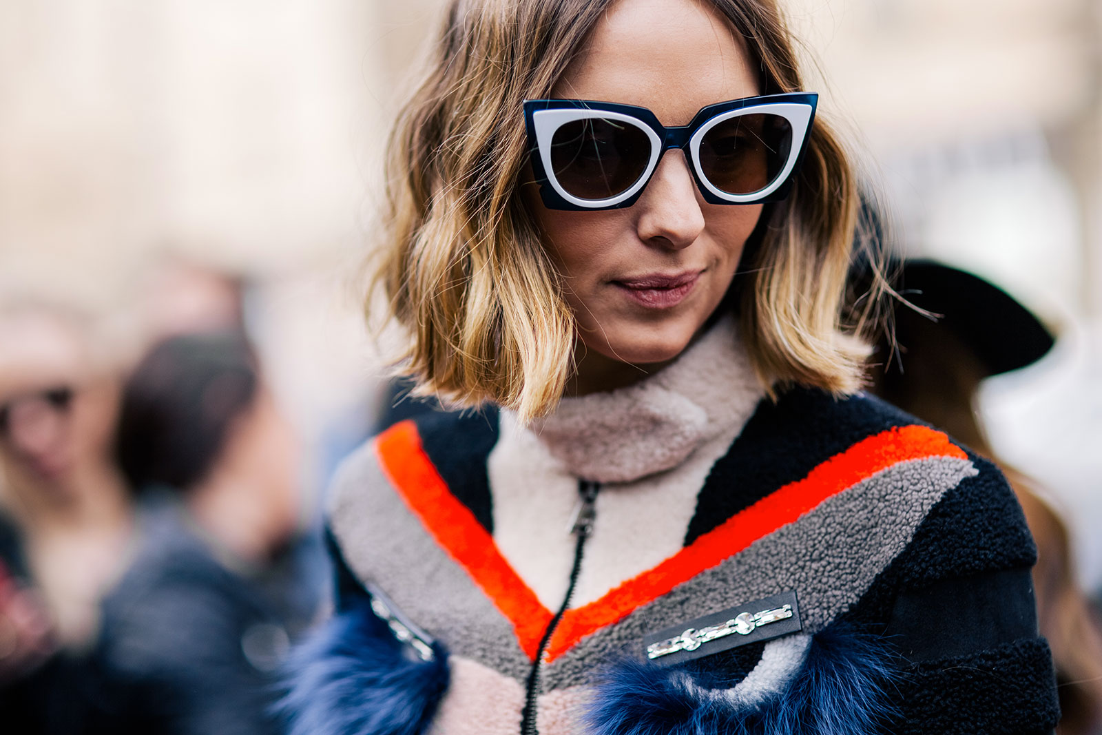 Candela Novembre wearing a Fendi jacket and Fendi sunglasses after the Fendi Fall 2015 fashion show in Milan, Italy