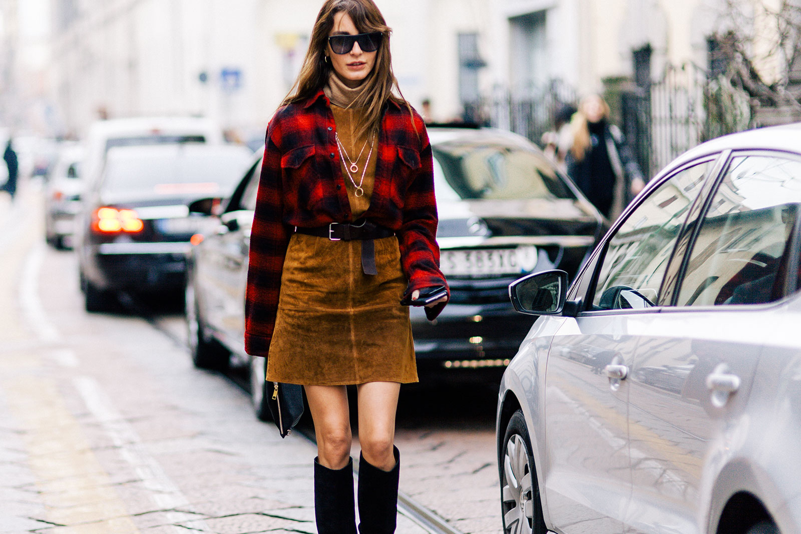 Ece Sukan wearing Ralph Lauren suede dress and checked shirt in Milan, Italy