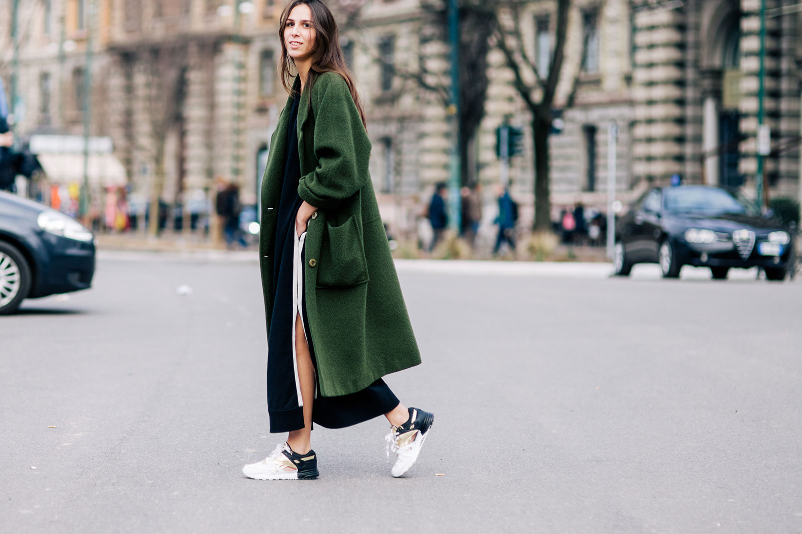 Elisabetta Di Maso wearing Acne Studios dress, vintage coat and Reebok sneakers in Milan, Italy