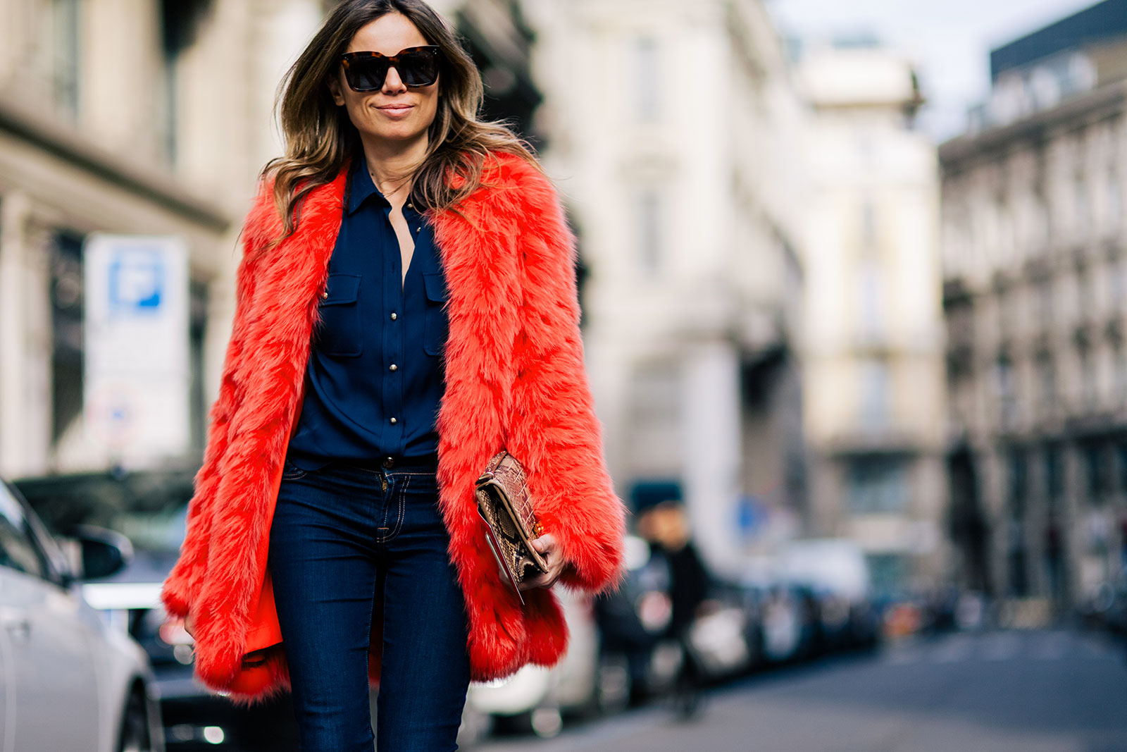 Erica Pelosini wearing jeans and fur jacket in Milan, Italy