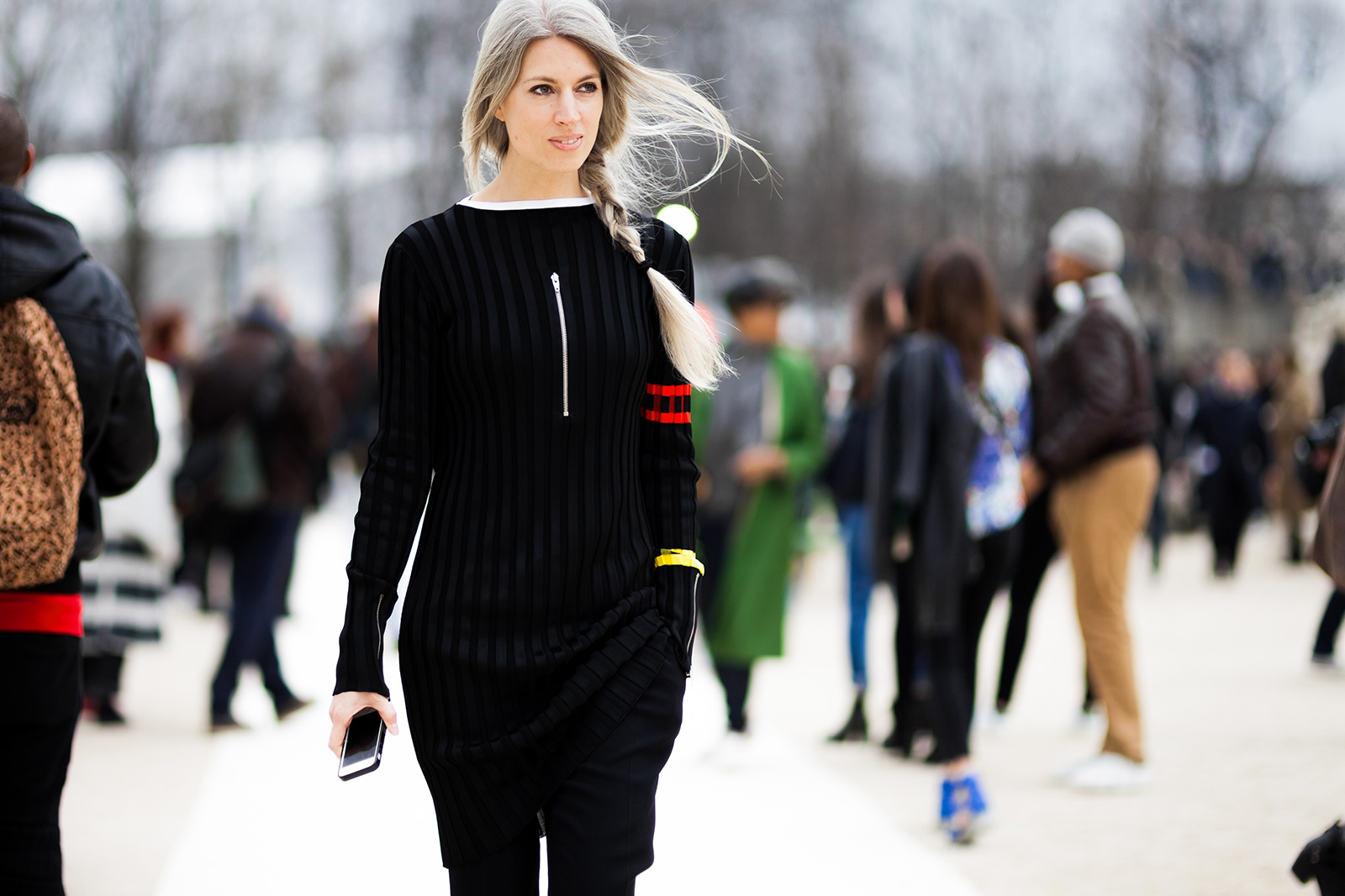 Sarah Harris wearing a black Celine top before the Valentino Fall 2015 fashion show at the Tuileries in Paris, France