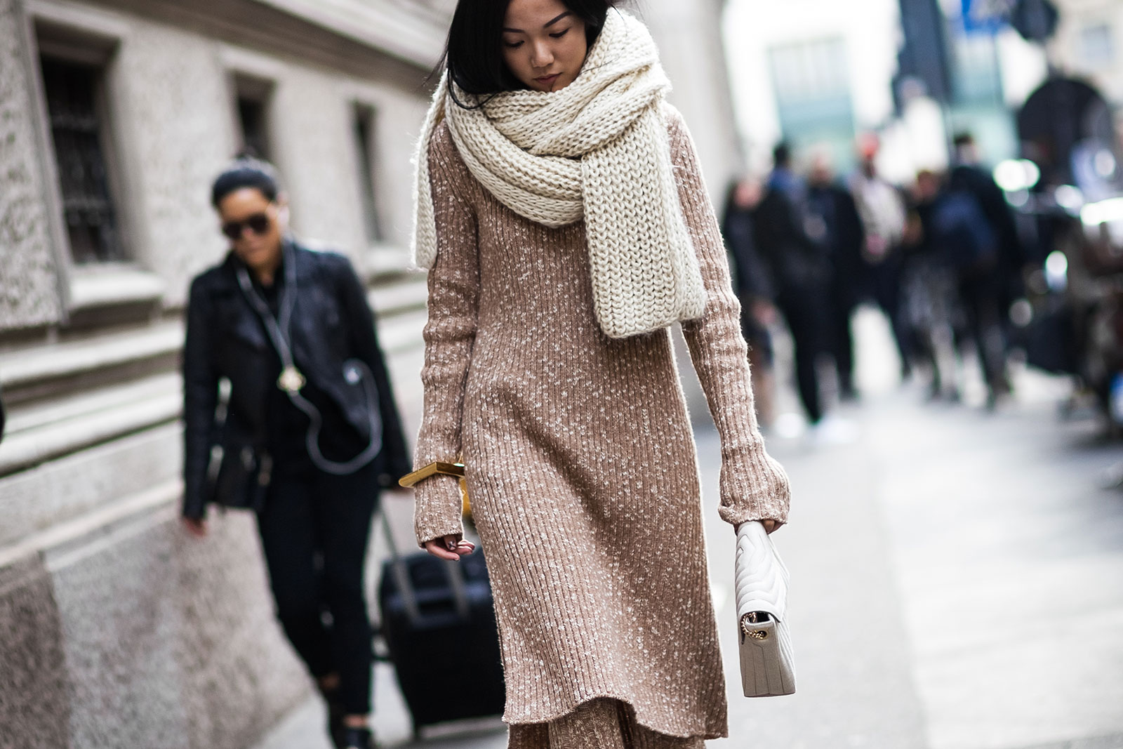 Yoyo Cao wearing Celine knitted sweater and pants and Salvatore Ferragamo bag before the Salvatore Ferragamo Fall/Winter 2015-2016 fashion show in Milan, Italy