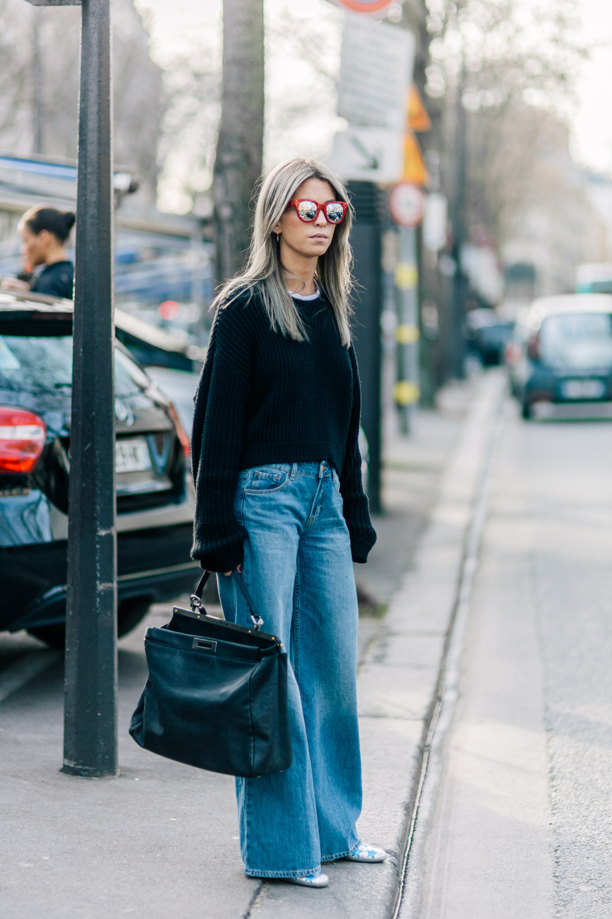 Carola Bernard wearing Zara jeans, Fendi bag, Spektre sunglasses and Saint Laurent boots after the Isabel Marant Fall/Winter 2015-2016 fashion show in Paris, France