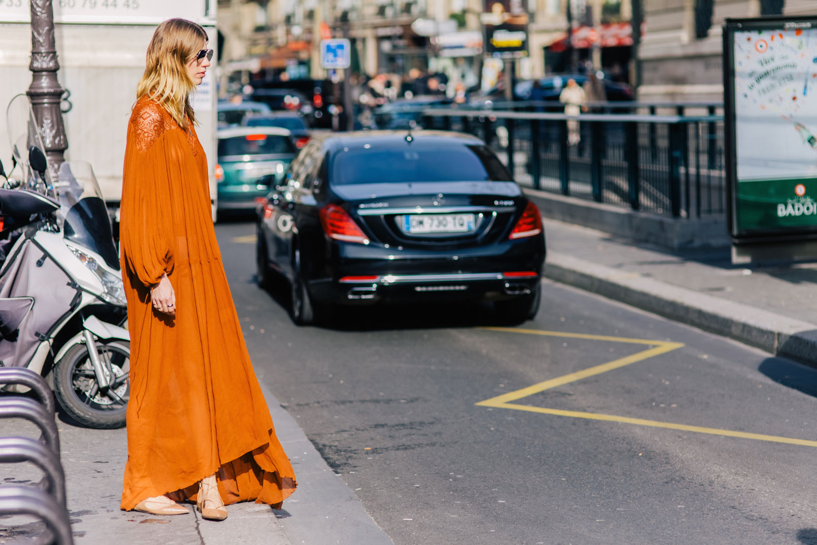 Veronika Heilbrunner wearing a long Chloe dress, Altuzarra shoes and Acne Studios sunglasses after a fashion show in Paris, France
