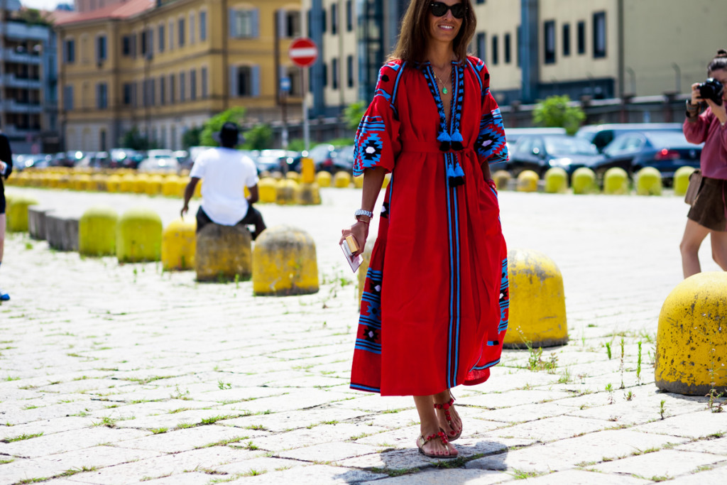 Viviana Volpicella wearing a red dress by Vitakin before the Gucci Men's Spring-Summer 2016 fashion show in Milan, Italy