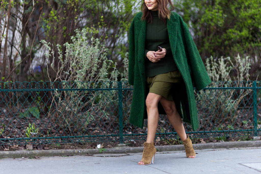Christine Centenera wearing a green coat by Off-White c/o Virgil Abloh in Paris, France