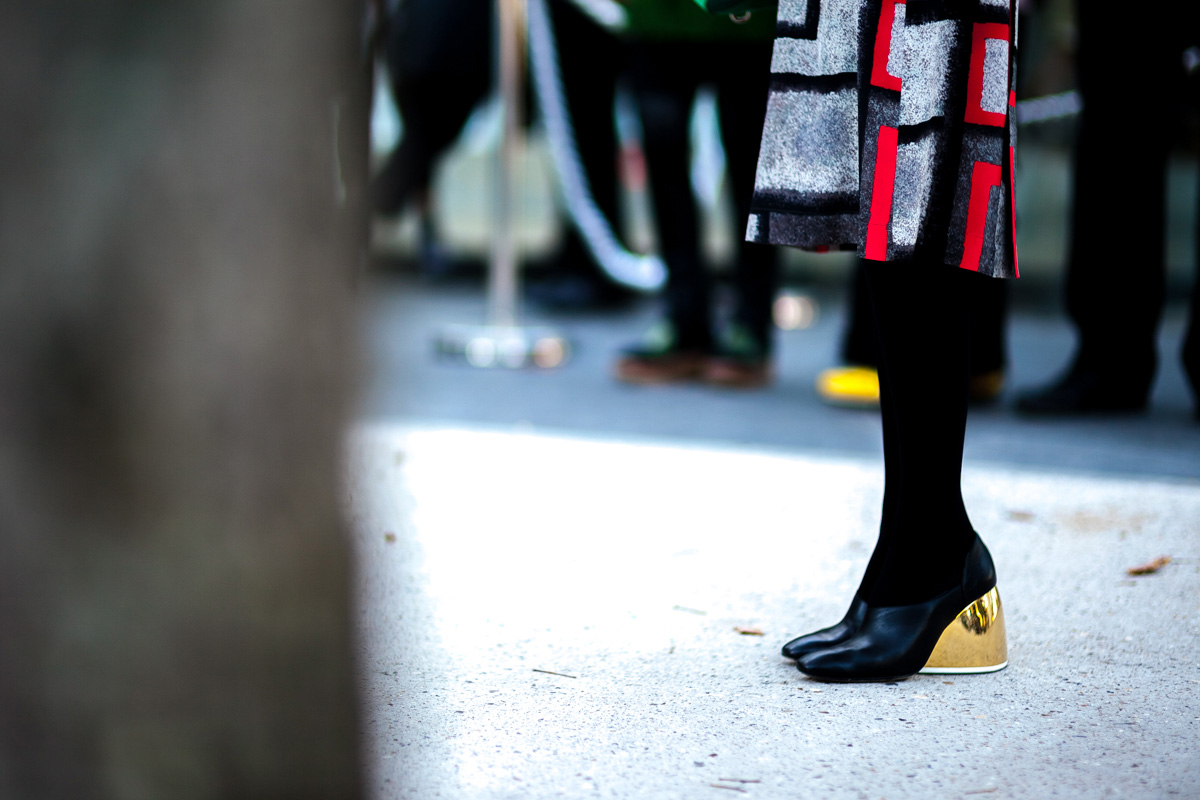 Kozue Akimoto wearing Loewe shoes and dress before the Loewe Spring 2016 fashion show in Paris, France