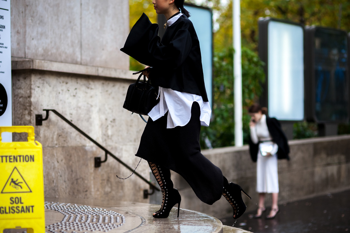 Margaret Zhang wearing lace-up boots before the Ellery fashion show in Paris, France
