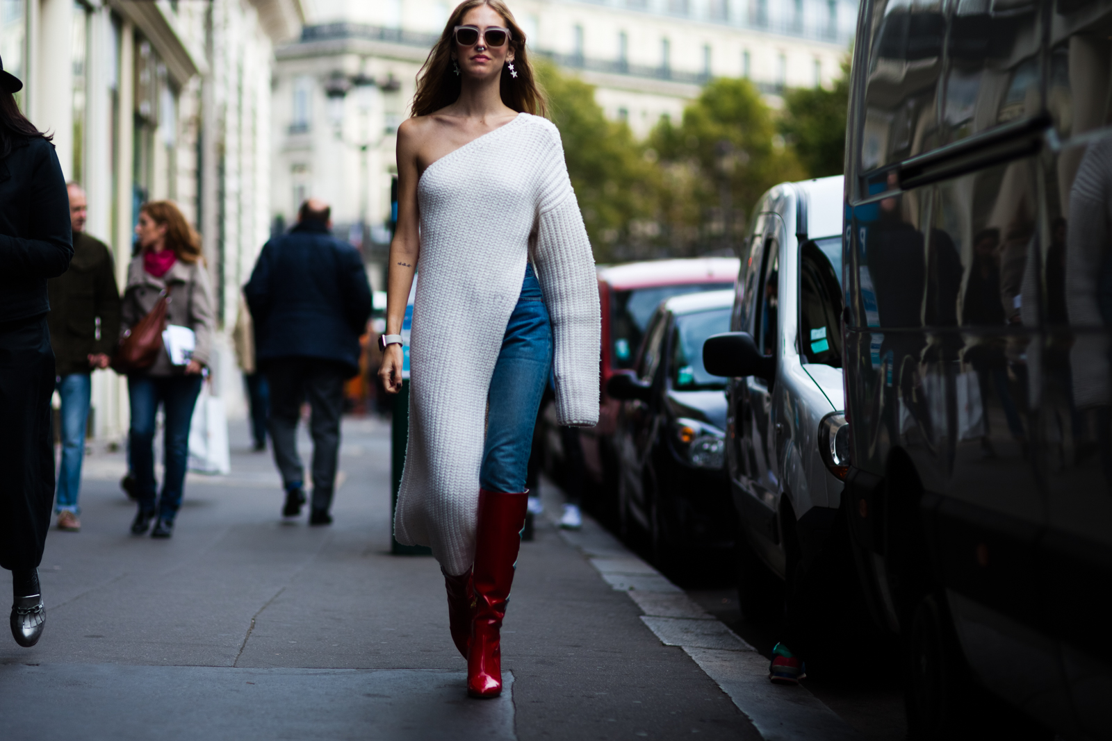 Chiara Ferragni wearing a white long sweater and jeans after the Stella McCartney fashion show in Paris, France