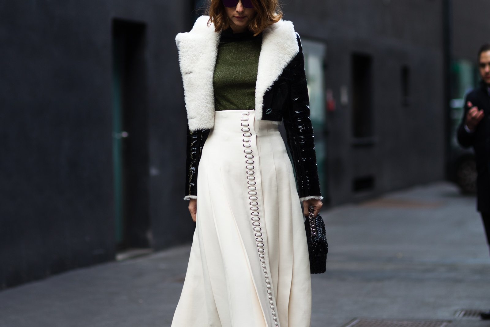 Candela Novembre wearing a Fendi skirt and a cropped jacket before a show in Milan, Italy
