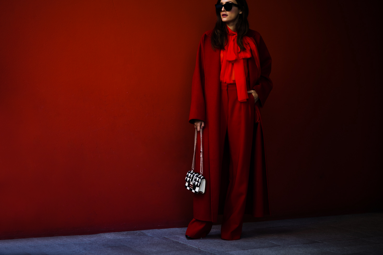 Eleonora Carisi wearing a total red outfit before the Emporio Armani Fashion show in Milan, Italy
