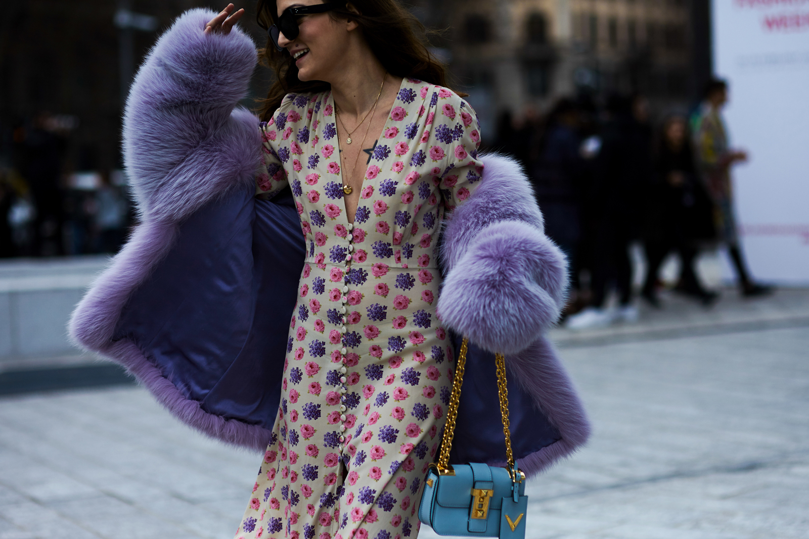 MFW Street Style: Italian blogger Eleonora Carisi wearing a long floral dress, fur coat, mules and Valentino Bag in Milan, Italy