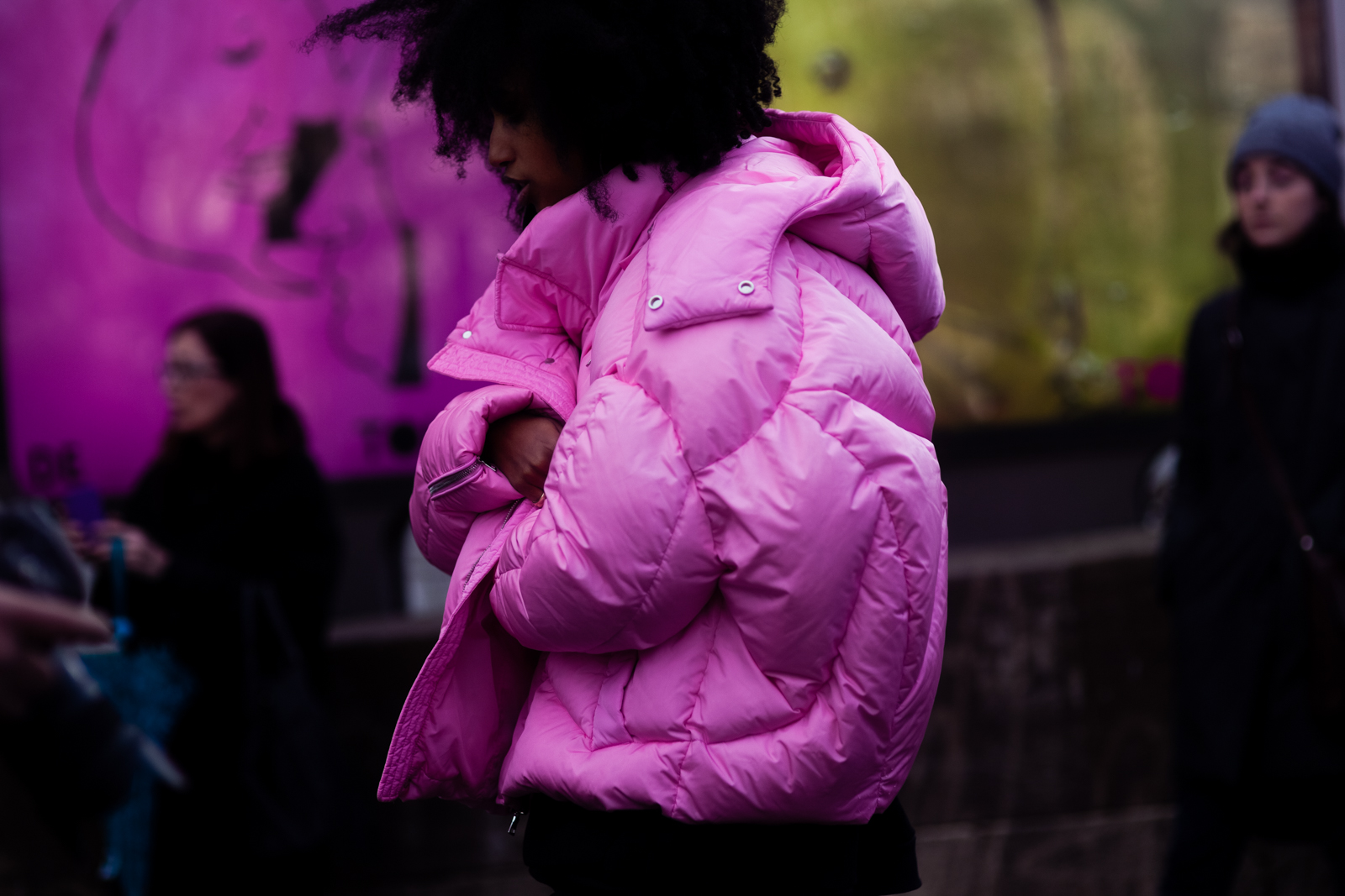 Julia Sarr Jamois wearing a pink puffer jacket and Vetements black hoodie before a fashion show in Paris, France