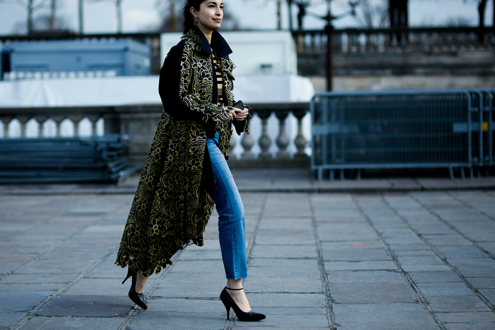 PFW Street Style: Caroline Issa wearing a Sacai coat and Mih jeans before the Valentino Fall/Winter 2016-2017 fashion show in Paris, France