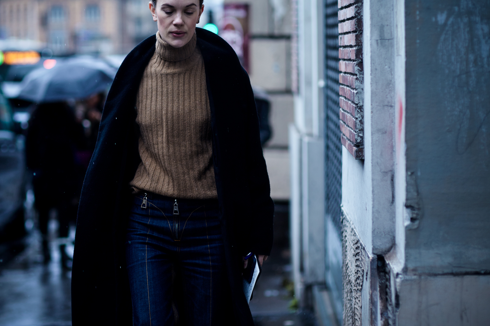 PFW Street Style: Jo Ellison wearing Louis Vuitton jeans, turtleneck sweater and a navy coat before a show at Paris Fashion Week Fall 2016