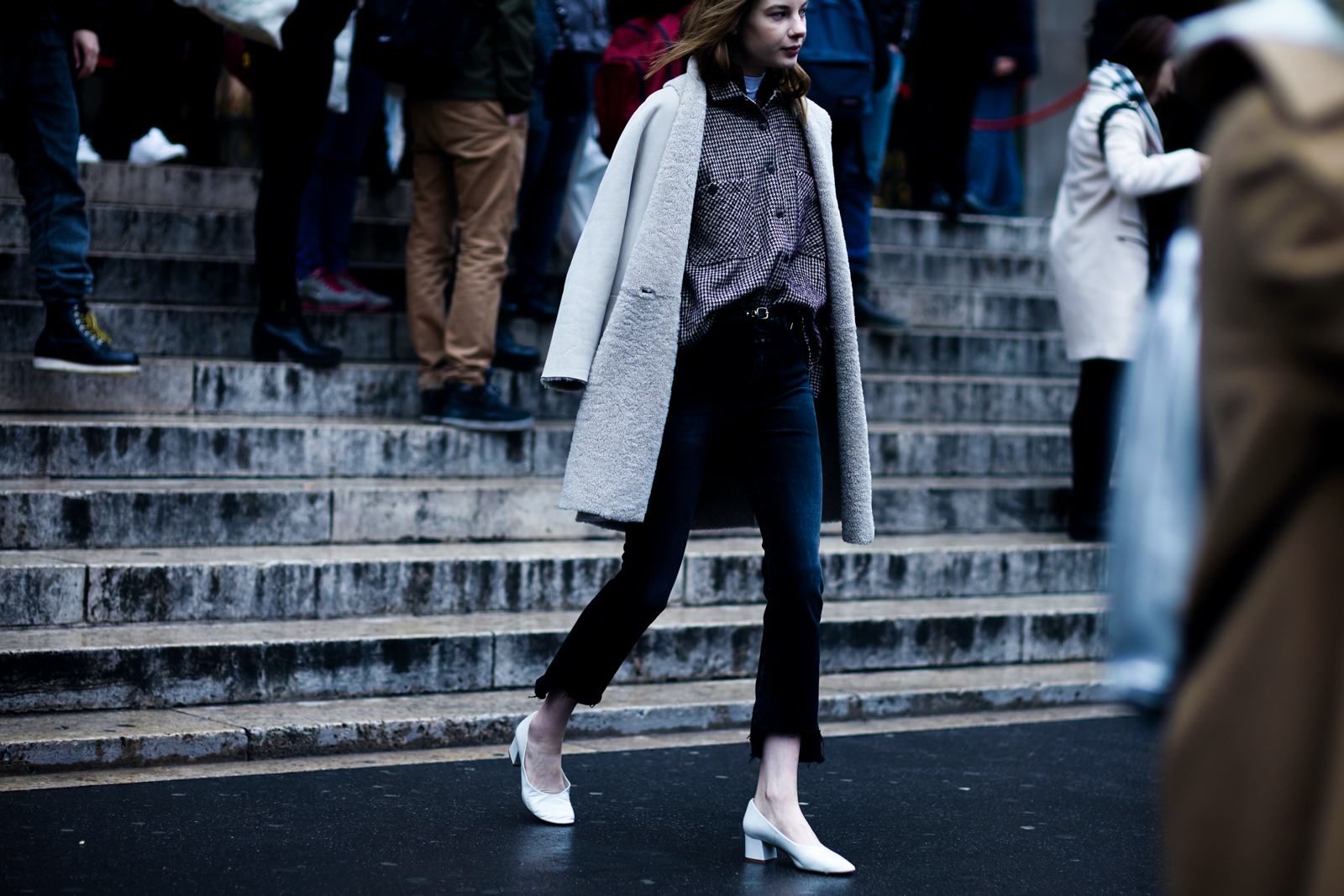 PFW Street Style: Model Michelle Meinert wearing black jeans and white shearling coat before the Stella McCartney Fall 2016 fashion show in Paris, France