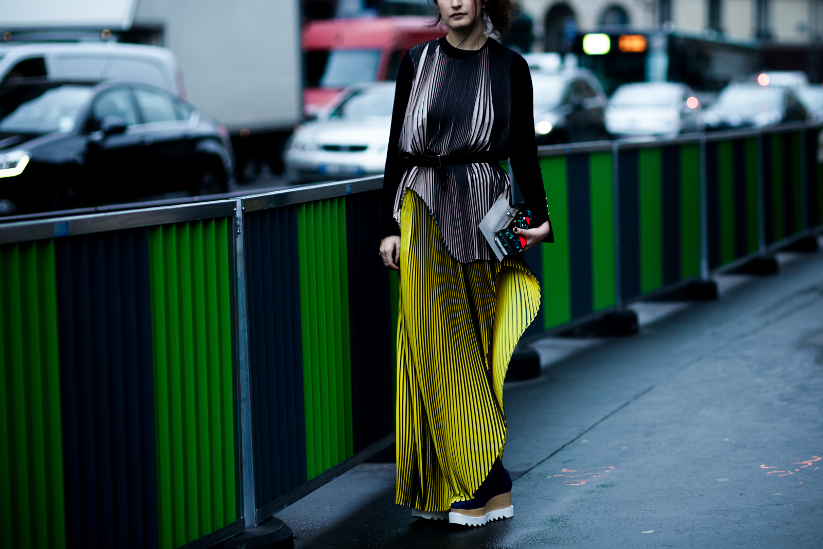 PFW Street Style: A woman wearing a Stella McCartney pleated skirt and top before the Stella McCartney fashion show in Paris