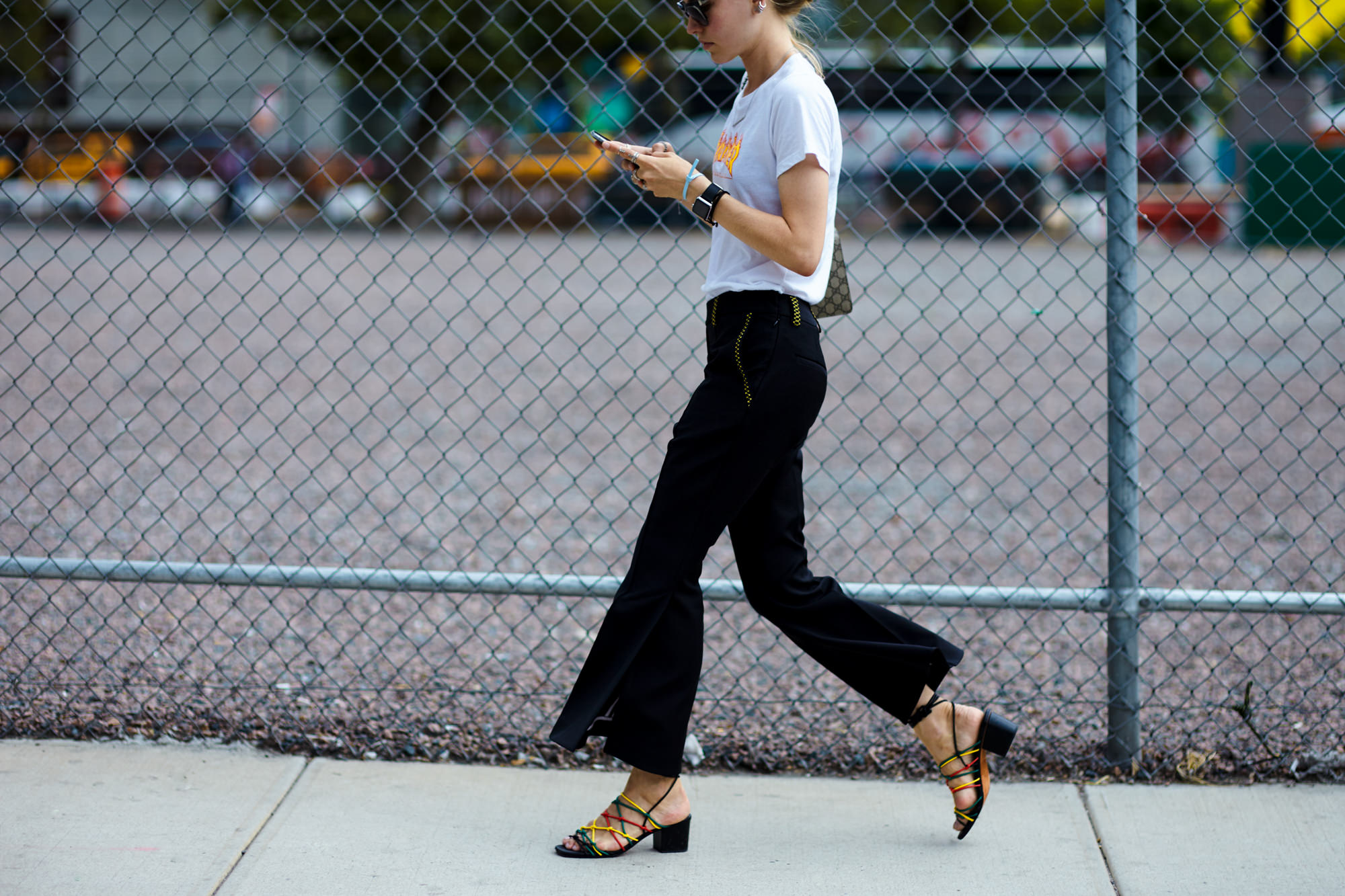 NYFW Spring-Summer 2017 Streetstyle: Jessica Minkoff wearing white t-shirt and black flare pants after a show in New York, September 2016