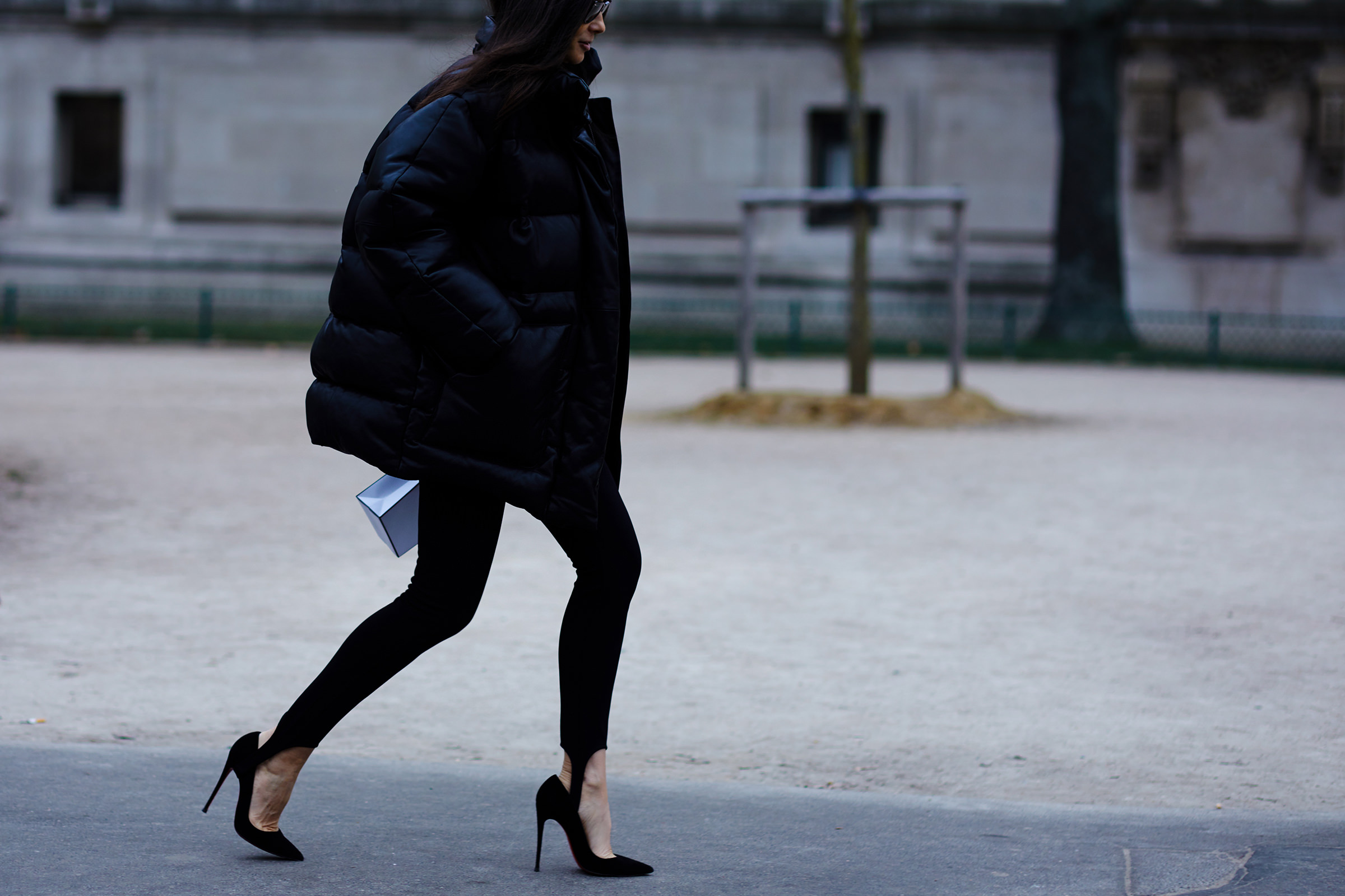 Paris Haute Couture S/S 2017 Street Style: Barbara Martelo wearing a black puffer jacket and black leggings after Chanel Haute Couture Fashion Show in Paris