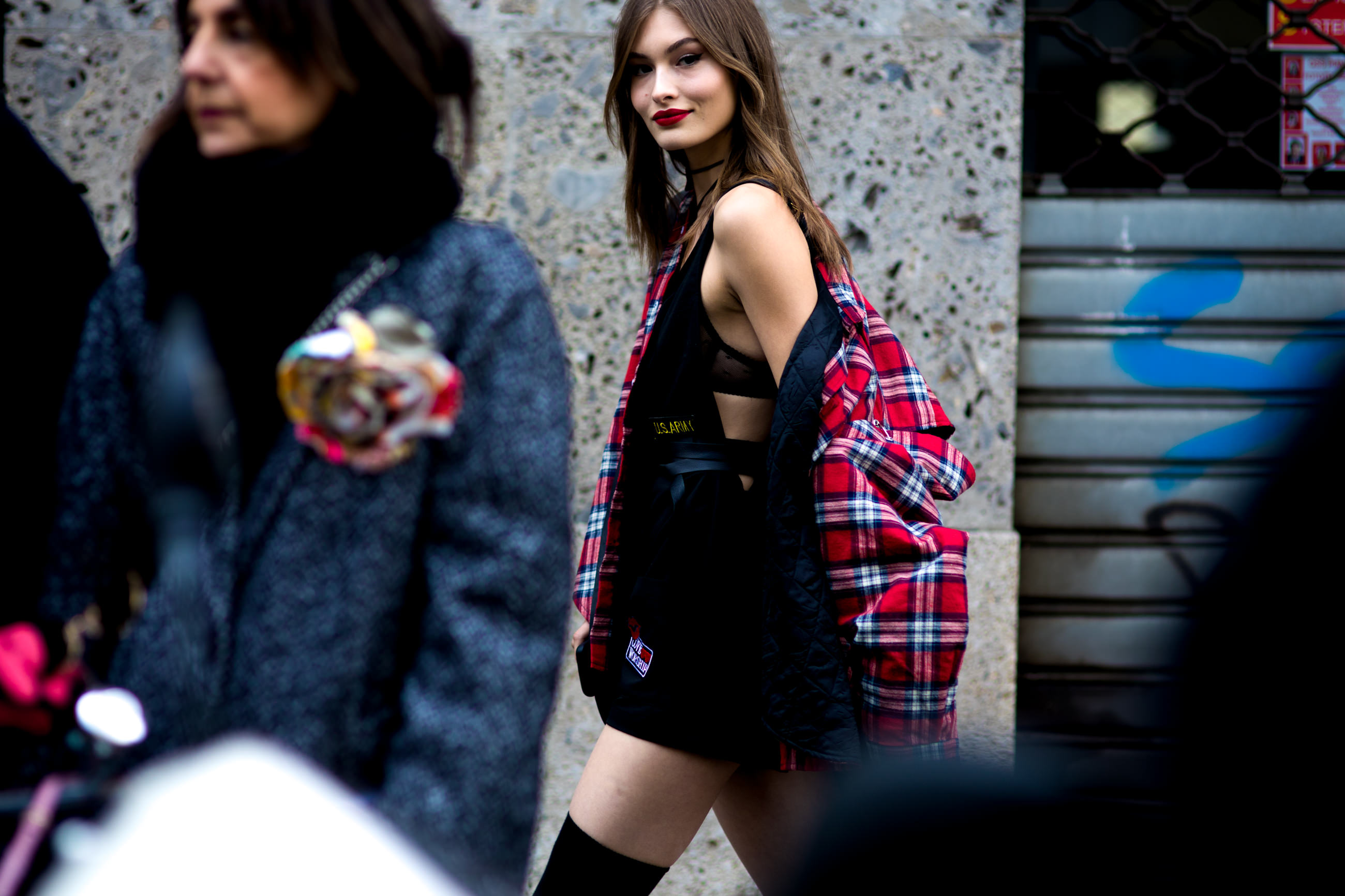 MFW FW17 Street Style: Grace Elizabeth wearing a plaid shirt after walking for Dolce & Gabbana FW 2017-2018 fashion show in Milan, Italy