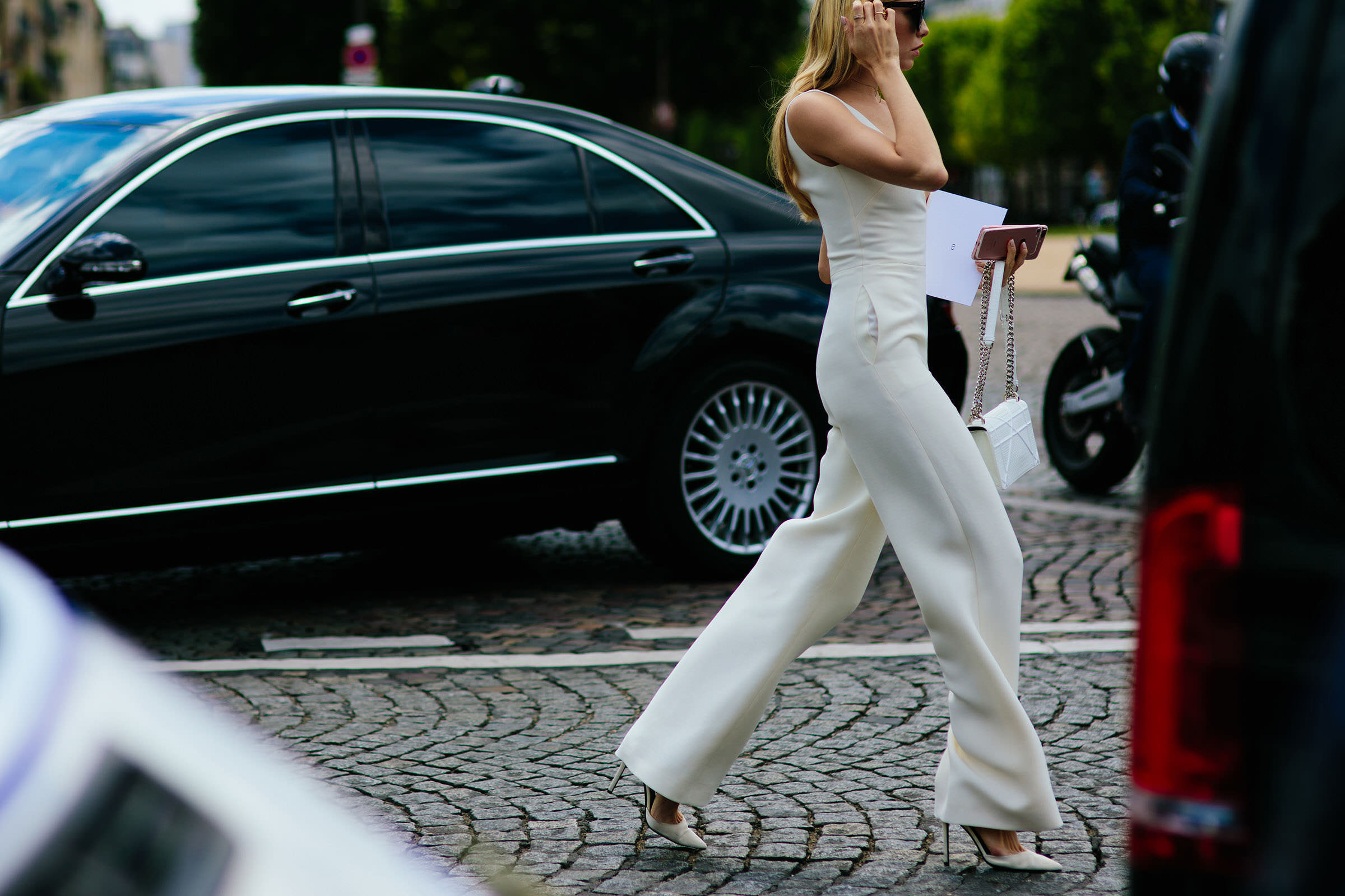 russian street style star wearing white outfit in paris