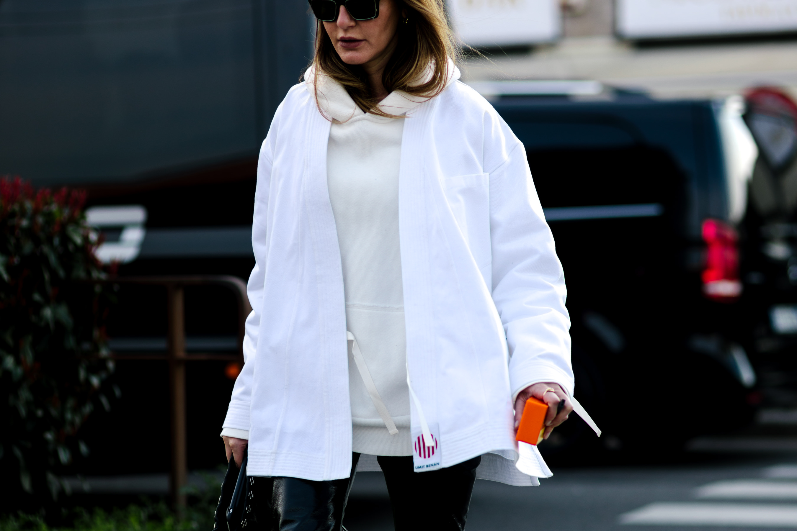 woman wearing white jacket