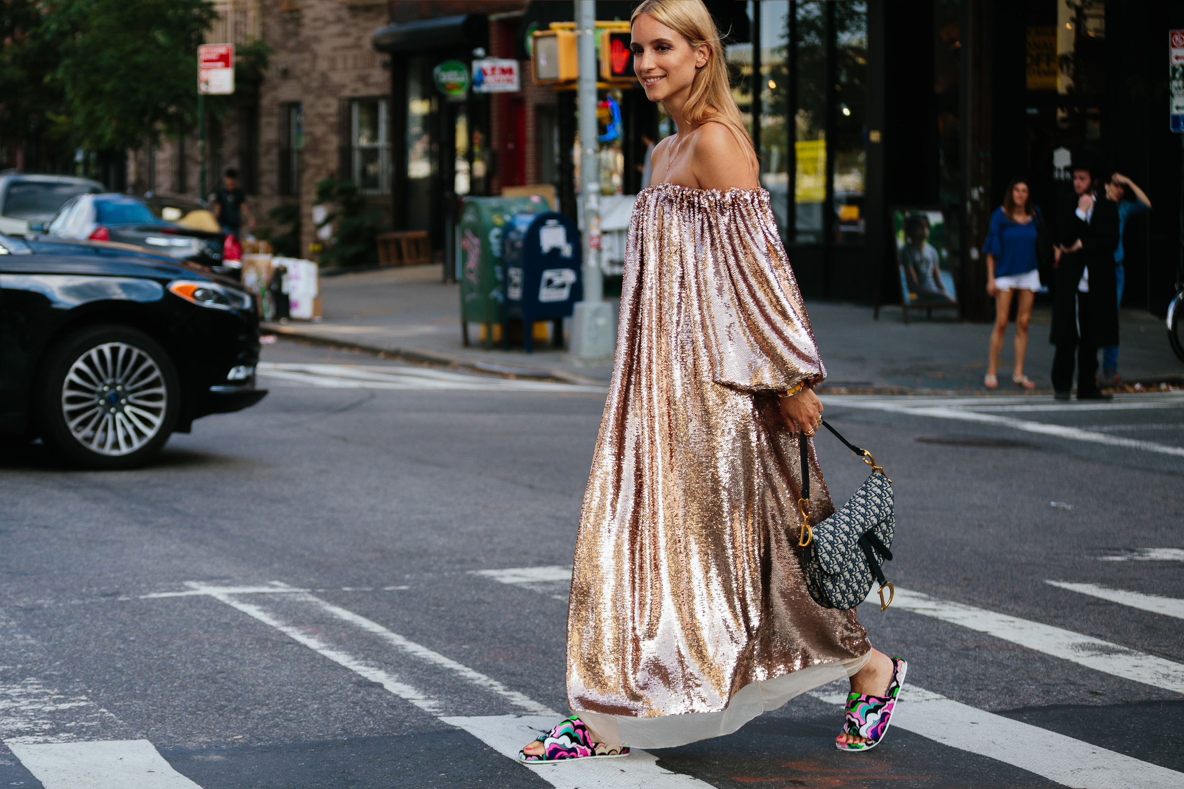Charlotte Groeneveld wearing a long sequined dress by Ulla Johnson and Emilio Pucci print slides at NYFW SS19