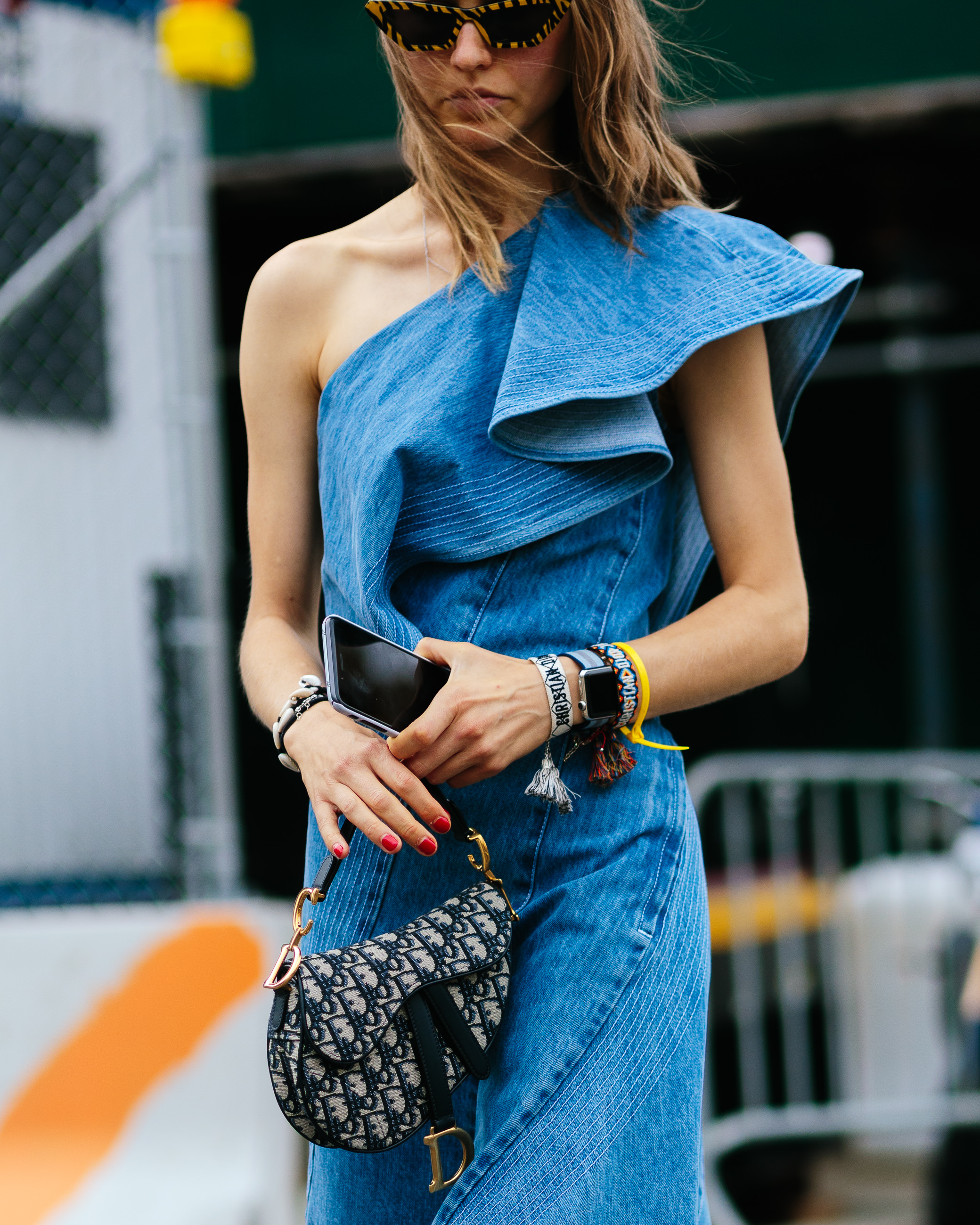 Jessica Minkoff wearing a denim dress and dior bag in NYC